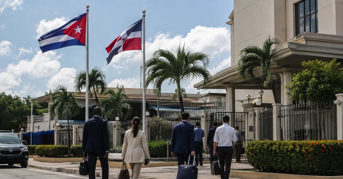Banderas de Cuba y República Dominicana frente a un edificio diplomático